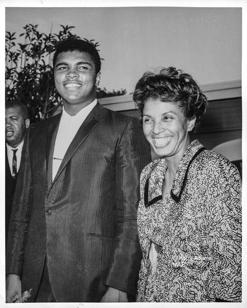 Icons and people - Muhammad Ali smiling with Lorraine Adams, Los Angeles, Aug 1964